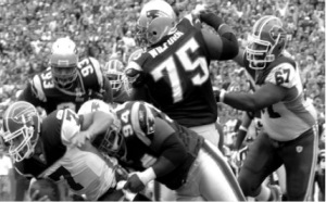 Vince Wilfork of the Patriots, mid-tackle